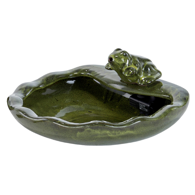A detailed close-up of the ceramic frog-shaped solar fountain, featuring its vibrant green glaze and charming frog spout.
