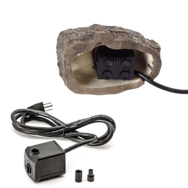 A close-up view of the electric pump hidden inside the Stonecreek Waterfall Rock, with a power cord visible.
